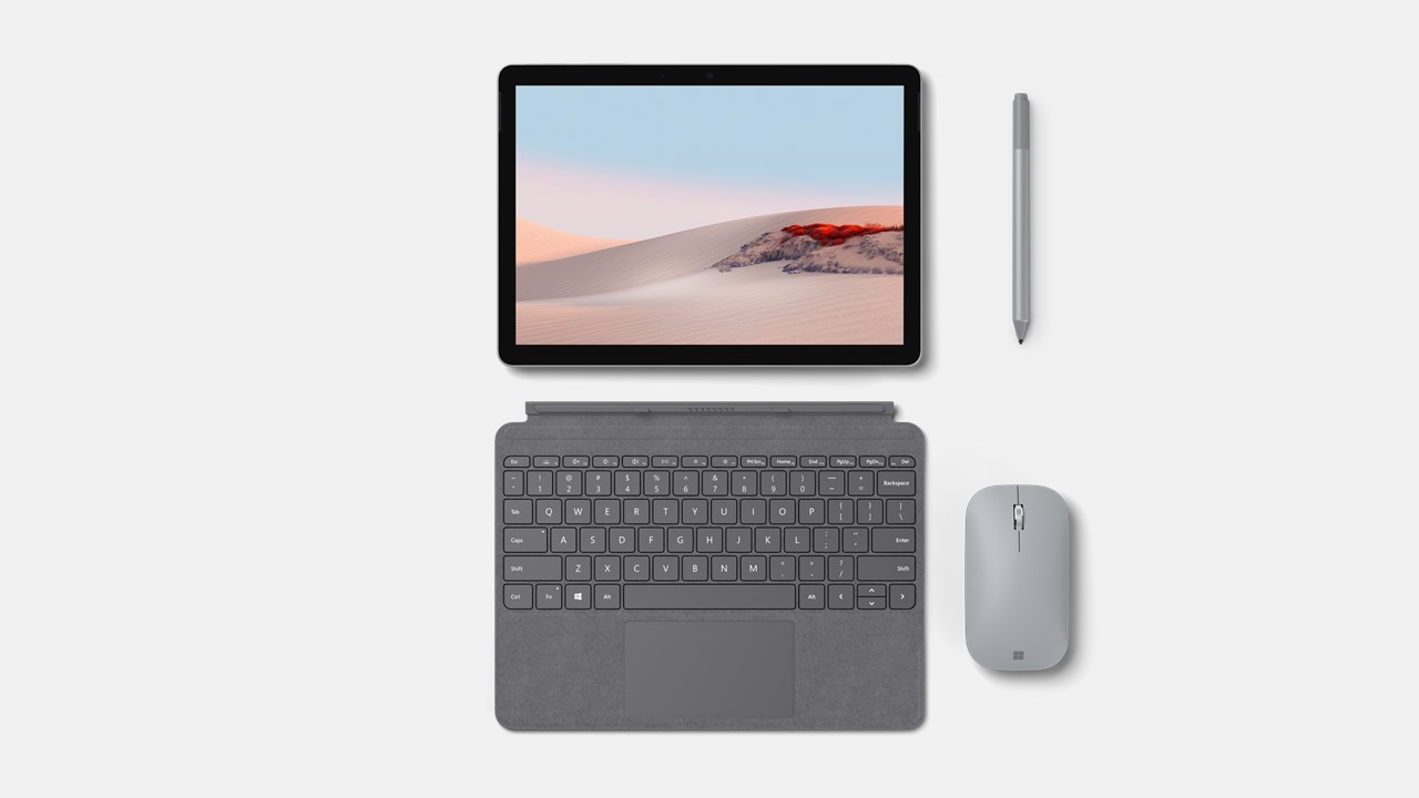 Surface Go 2 for Business von oben mit grauer Tastatur, grauer Maus und grauem Stift